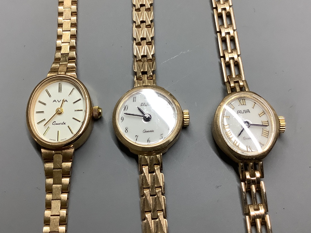 Three assorted lady's modern 9ct gold Avia quartz wrist watches on 9ct gold bracelets